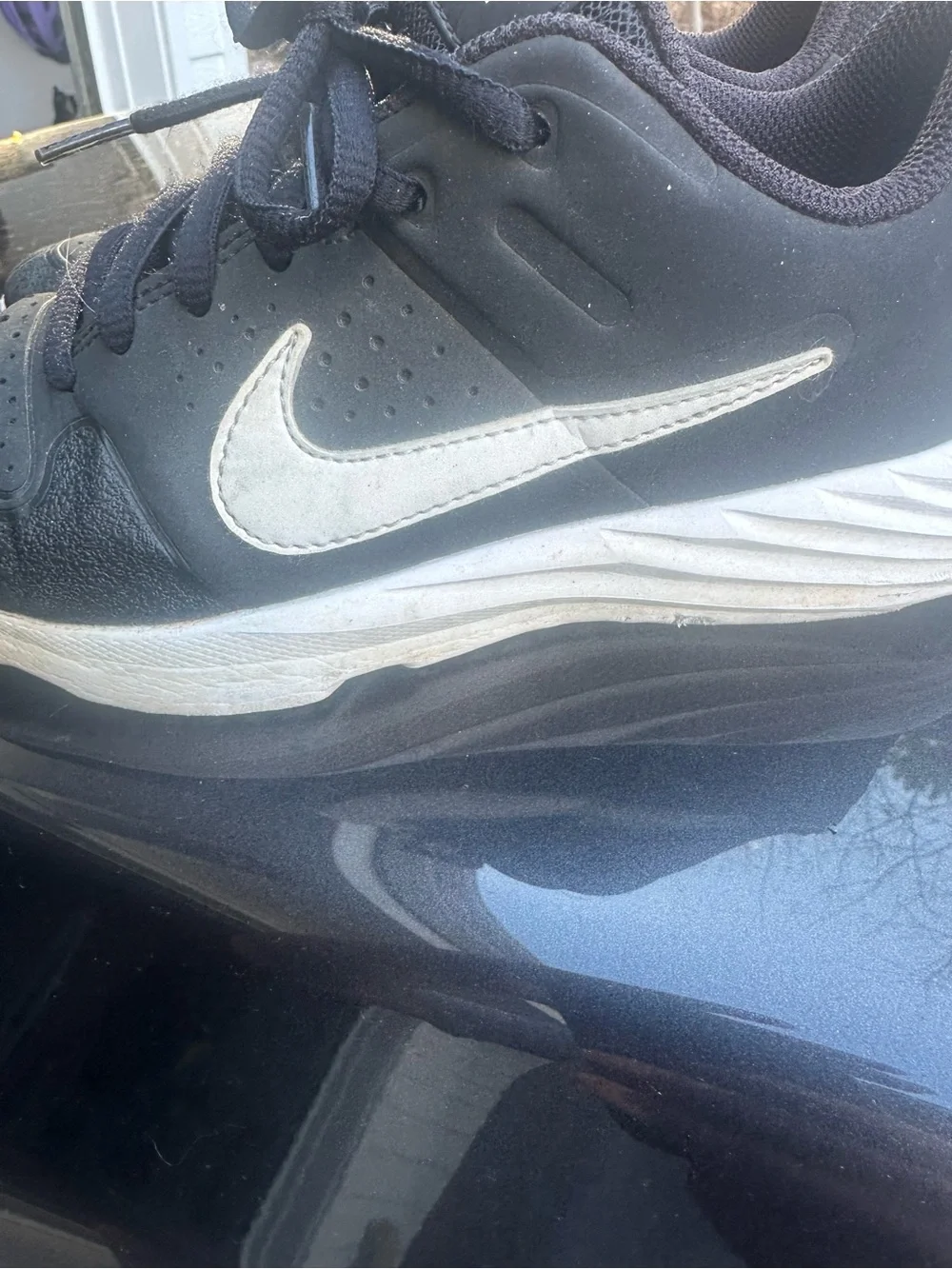 Nike Black with White Swoosh Low-Top Turf Sneakers